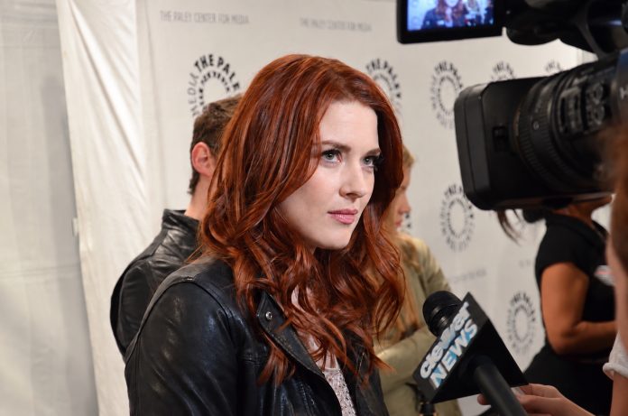 Alexandra Breckenridge speaking to an interviewer at a Paley Center event