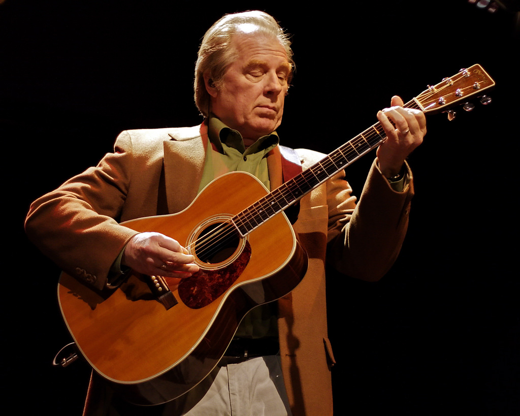 Michael McKean, Annette O’Toole’s husband, playing an acoustic guitar in April 2009